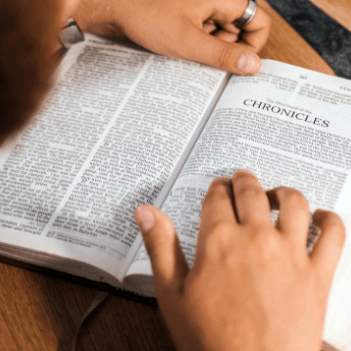 A Bible opened for reading and prayer.
